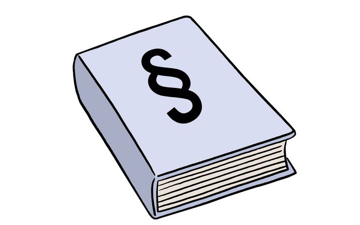 Ein Buch mit einem Paragraphen-Zeichen